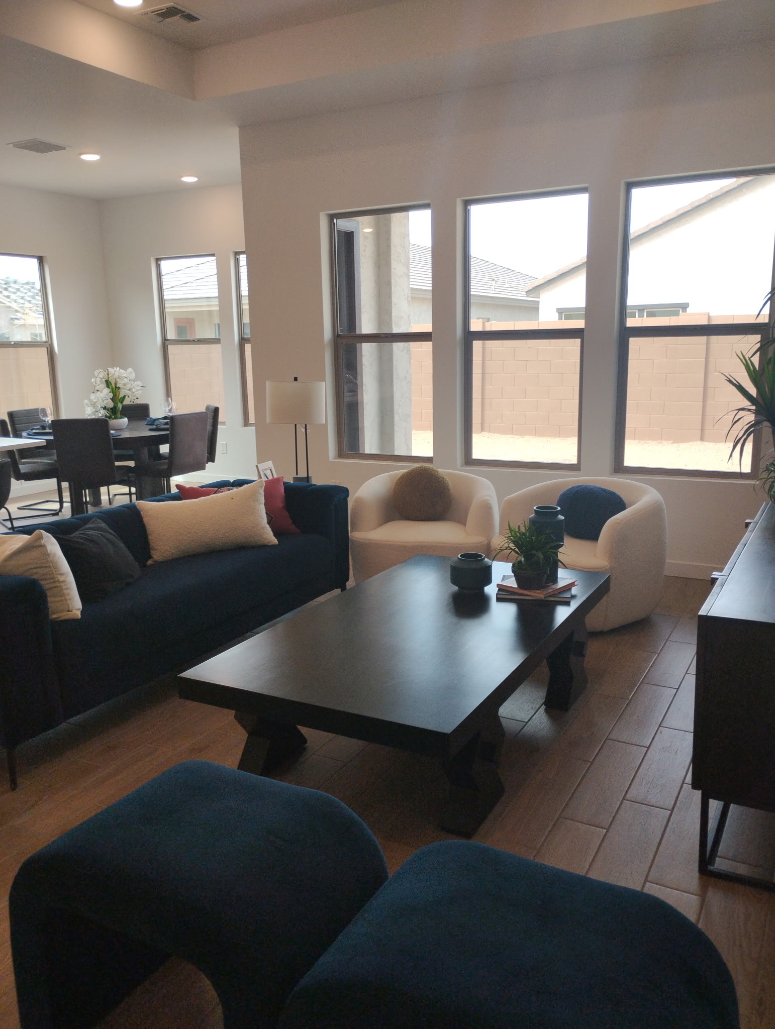 Clean living room with blue furniture